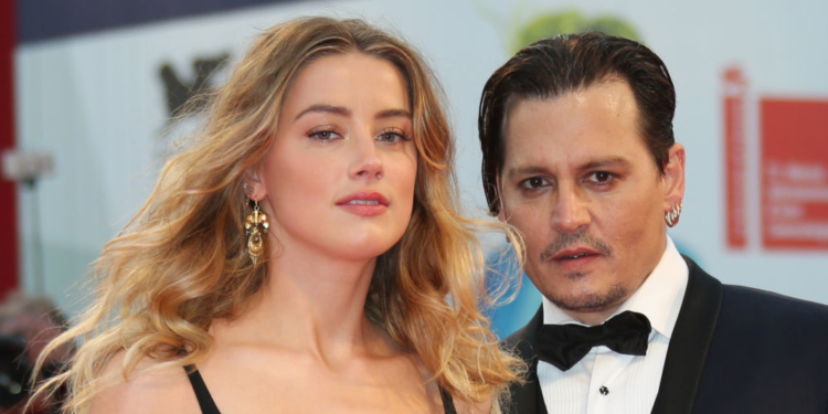 Actors Johnny Depp and Amber Heard attending the film Black Mass during the 72nd edition of the Venice Film Festival in Venice, Italy, Friday, Sept. 4, 2015.